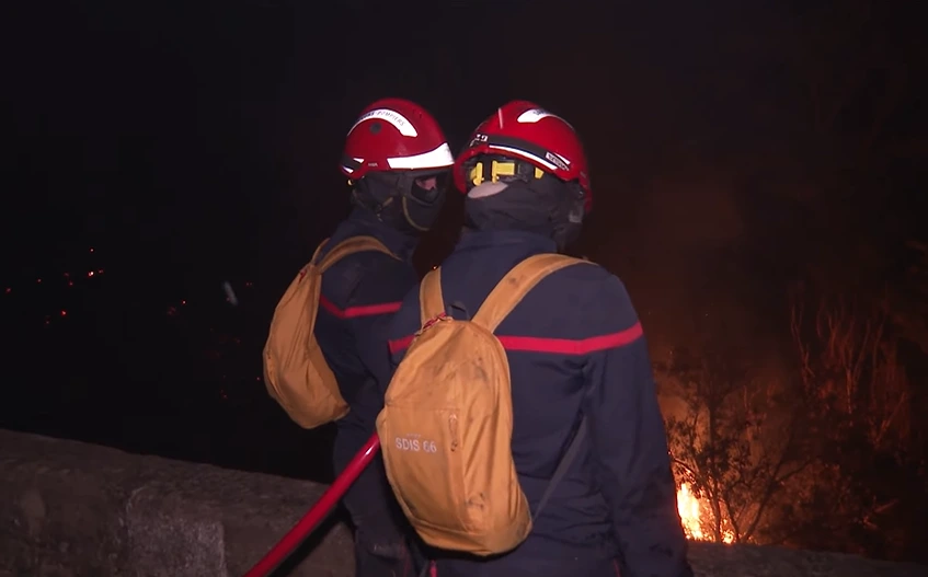 firefighters working to stop the wildfire in france